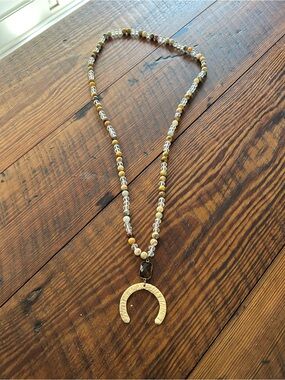 Beaded Brown and Gold Crescent Pendant Necklace